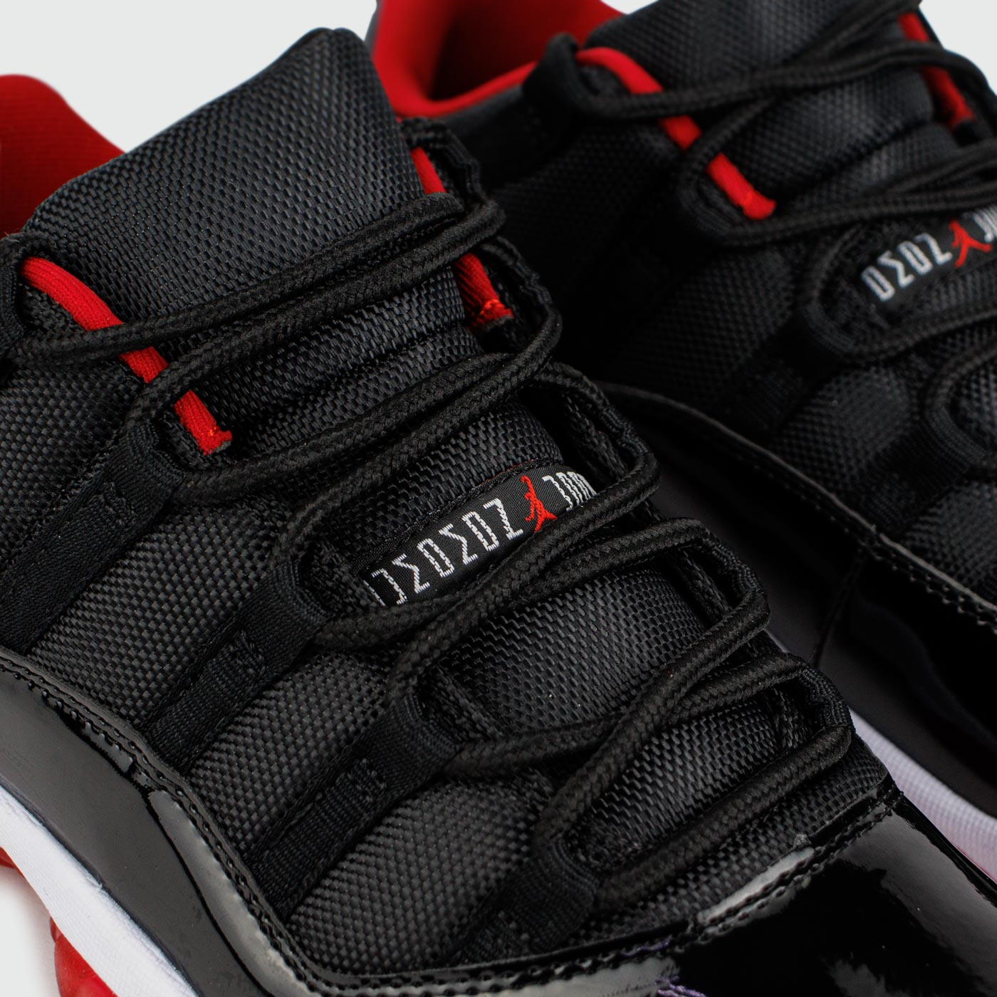 JORDAN AIR 11 NEGRO ROJO