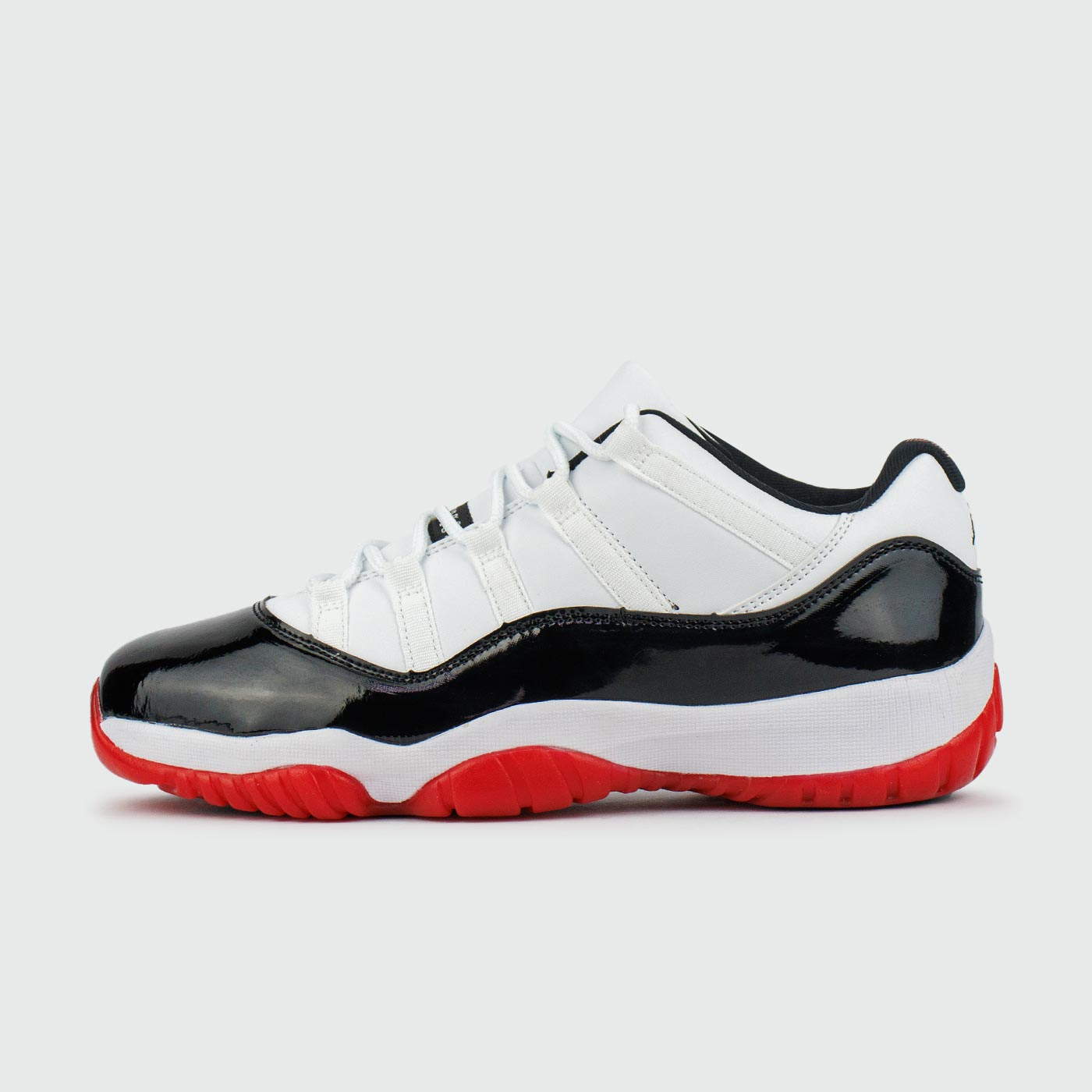 JORDAN AIR 11 NEGRO BLANCO ROJO