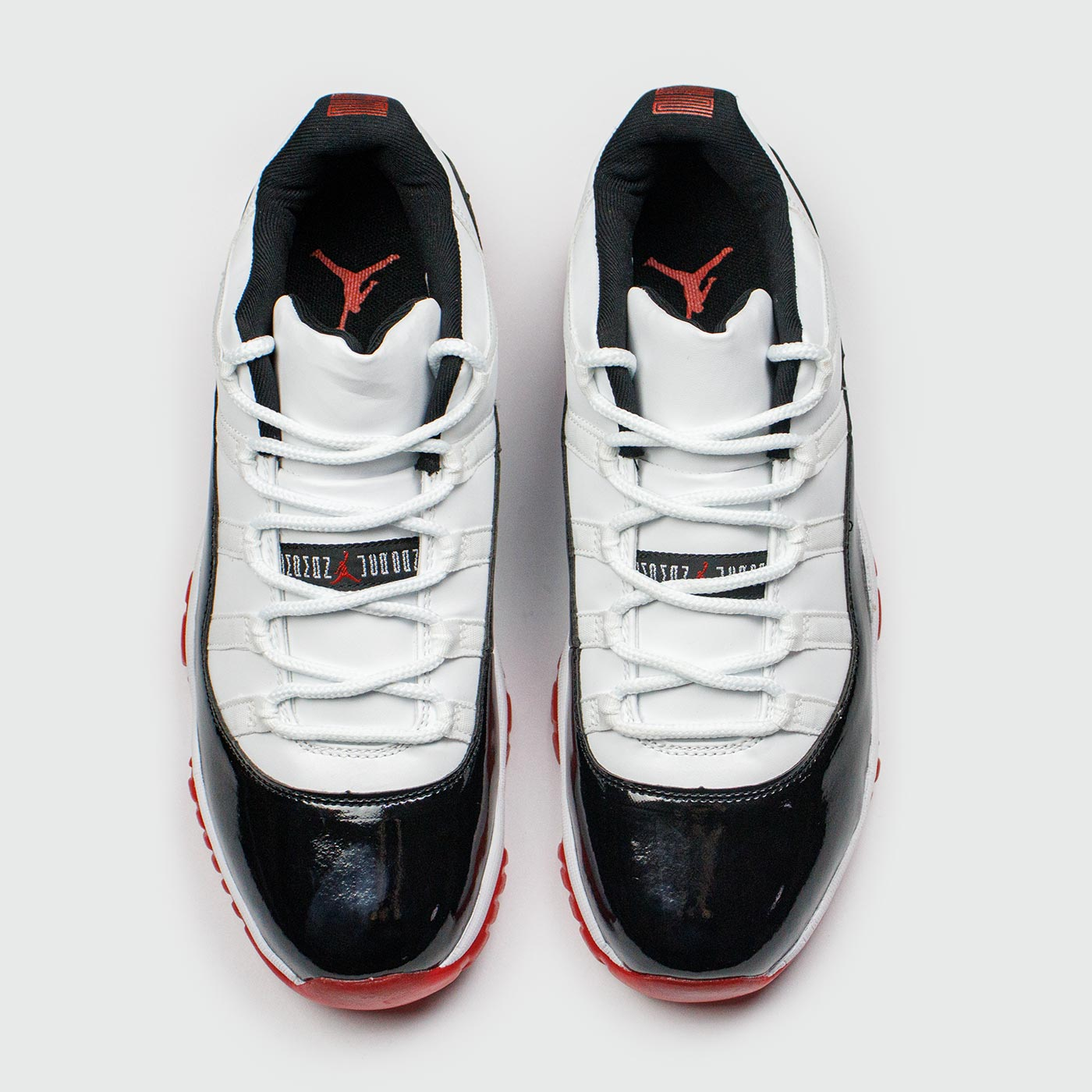 JORDAN AIR 11 NEGRO BLANCO ROJO