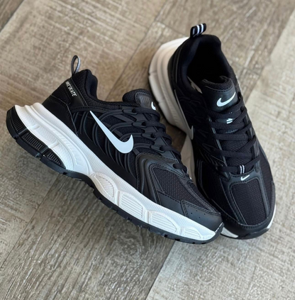 NIKE STAKE NEGRO BLANCO